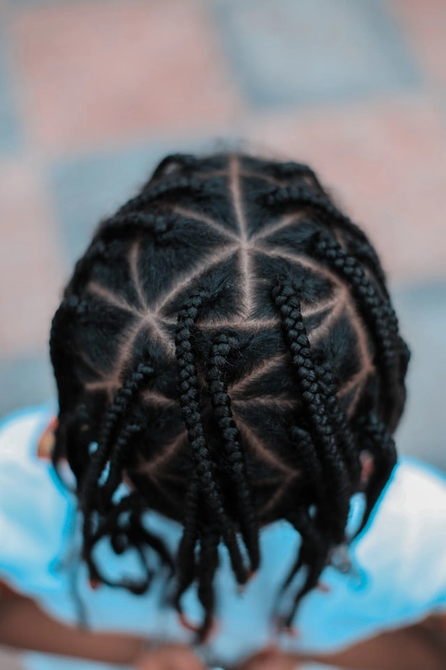 Tight braided hair sectioned into triangles